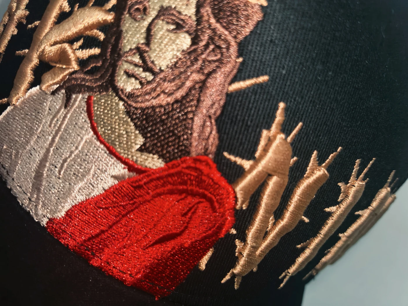Craft detail only — an embroidery close-up from a separate custom project. No full product or customer case is presented.