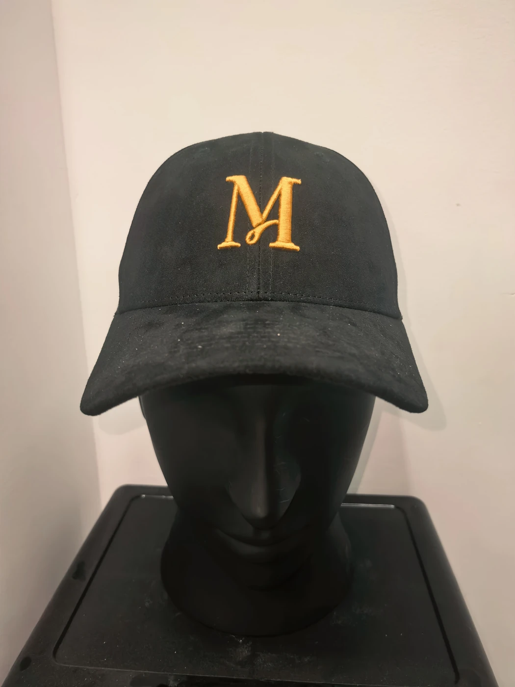 Gold-tone lettering & interior details — Front view