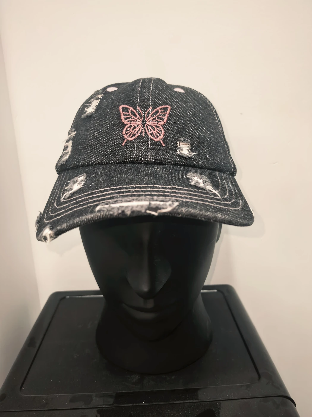 Butterfly motif & custom interior — Front view