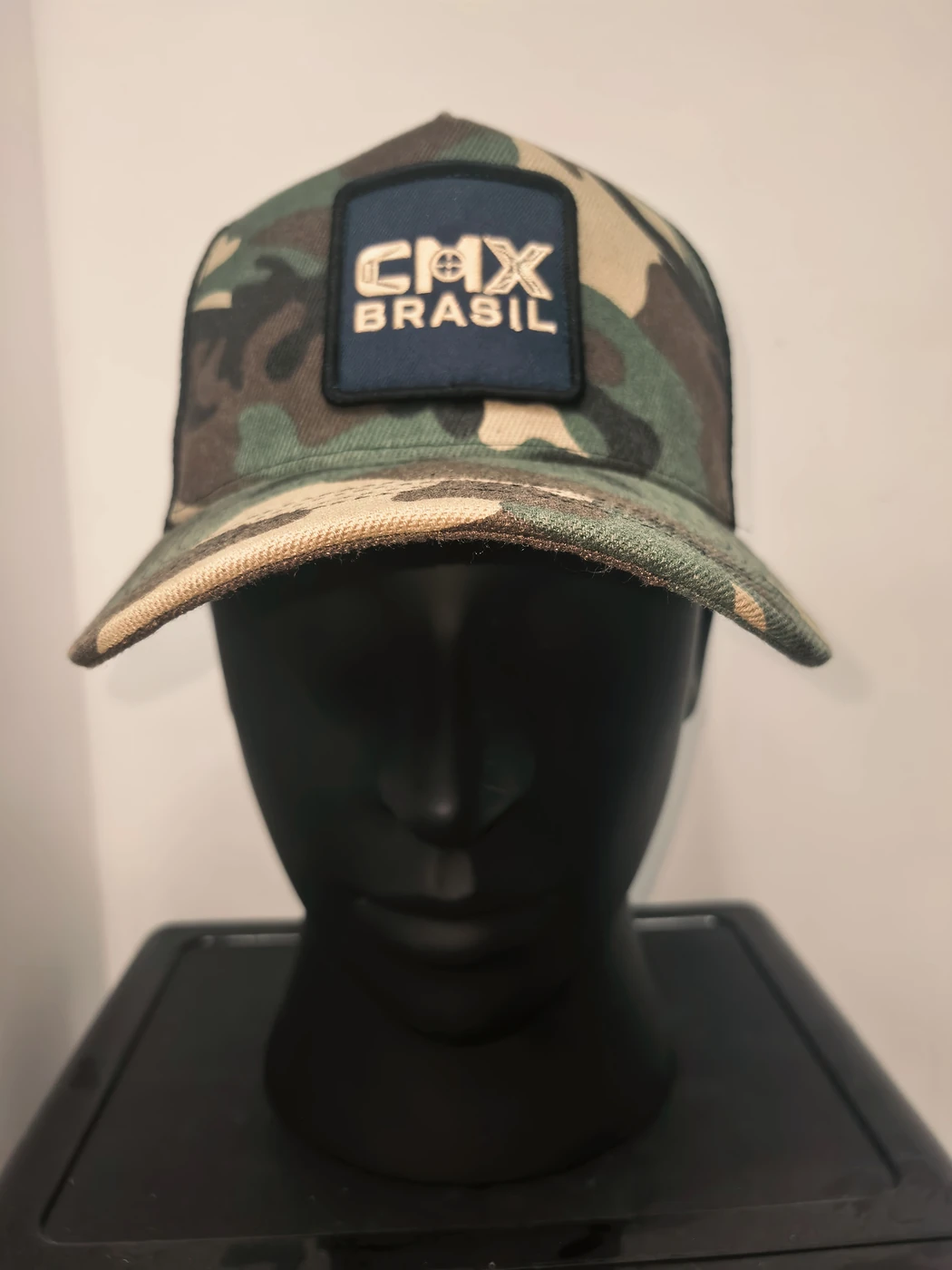 Camouflage cap & embroidered patch — Front view