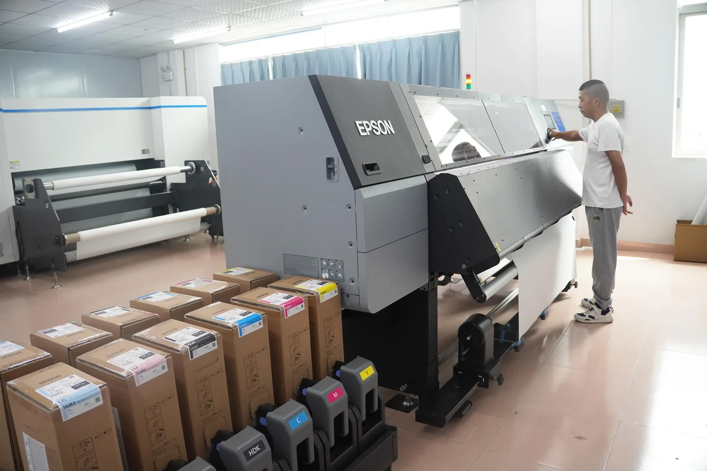 EPSON digital printer preparing artwork transfers on the production line